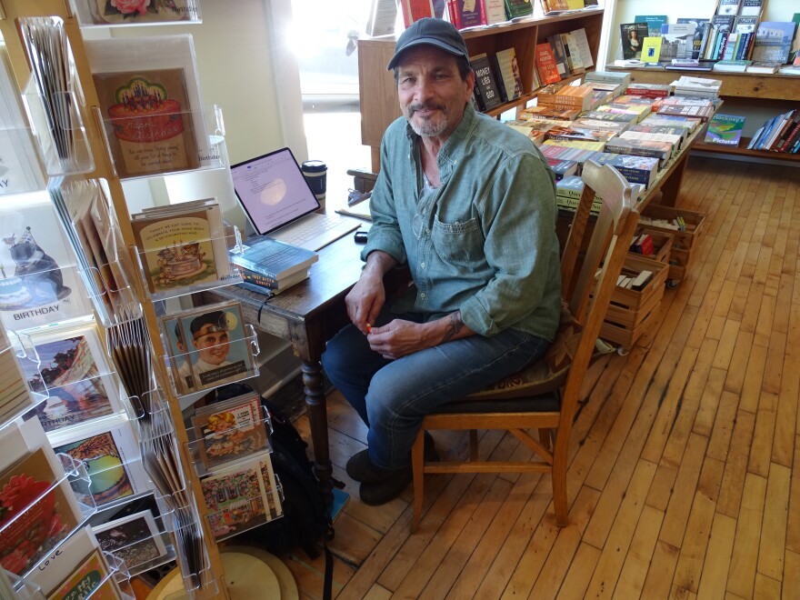 Jim DeVita at one of his writing spots at Arcadia Books in Spring Green.