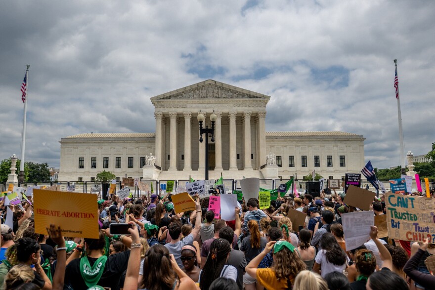 People protest in response to the Dobbs v Jackson Women's Health Organization ruling in front of the U.S. Supreme Court on June 24, 2022 in Washington, DC. The Court's decision in Dobbs v Jackson Women's Health overturns the landmark 50-year-old Roe v Wade case and erases a federal right to an abortion. (Brandon Bell/Getty Images)