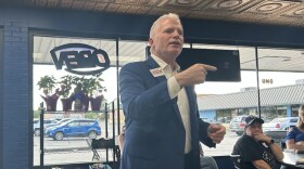 Mike Cox speaks to voters at Cops and Donuts in Mount Pleasant on Tuesday, June 24, 2026