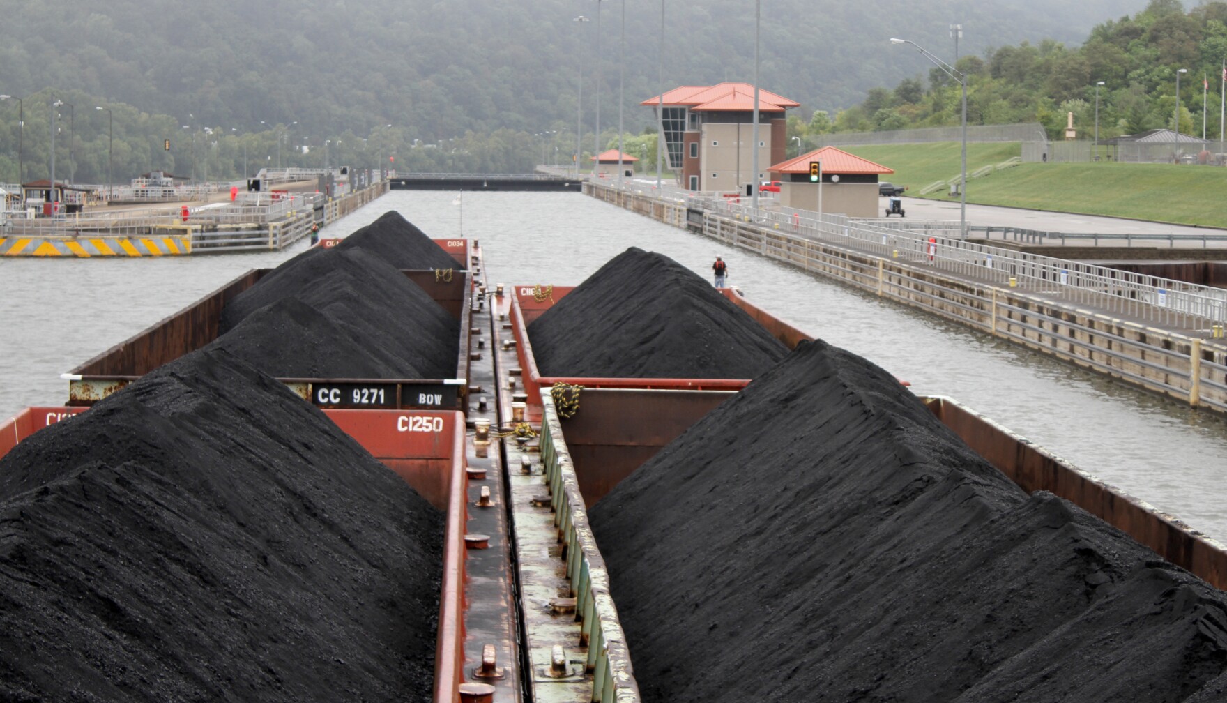 Five barges full of coal being transported along the Kanawha River in Marmet, W.Va.