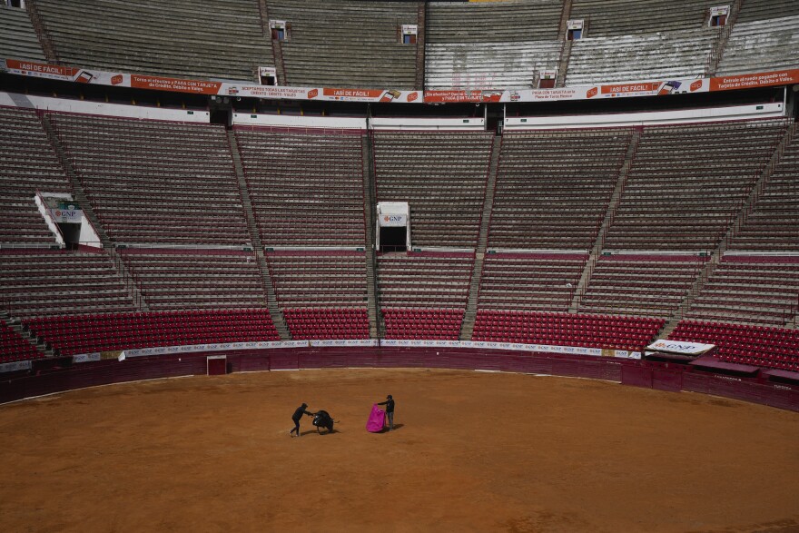 Bullfighters practice at the Plaza de Toros Mexico bullring in Mexico City, Tuesday, Dec. 12, 2023. The spectacle took a critical blow in 2022 when a judge banned bullfighting in Mexico City, but now that the country's Supreme Court of Justice has overturned the ban, the controversial sport is set to return to the capital, home to what is billed as the world's largest bullfighting ring.