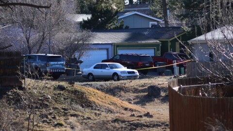 Law enforcement respond to aneighborhood in Flagstaff, Ariz. ,where police say a man opened fire on officers on Thursday, Feb. 5, 2026. (AP Photo/Cheyanne Mumphrey)