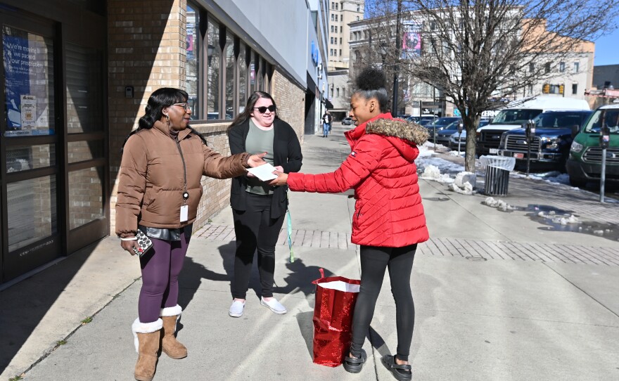 Aniyah Taylor hands out Valentines in Wilkes-Barre.
