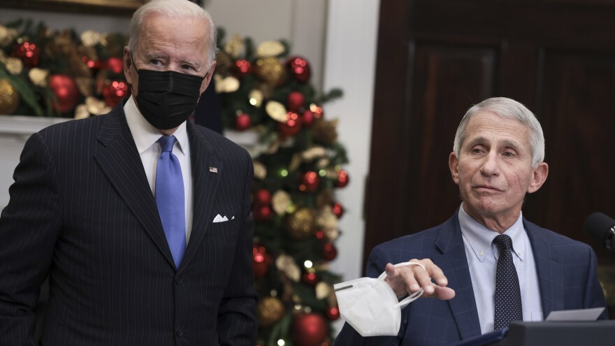 Anthony Fauci, (right) director of the National Institute of Allergy and Infectious Diseases and chief medical adviser to the president, speaks alongside President Joe Biden following a meeting of the COVID-19 response team at the White House on Nov. 29, 2021.
