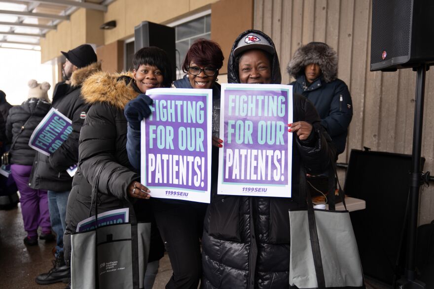 Some protestors stand outside Anthony Jordan Health Center rallying for better Medicaid reiumbursement rate.