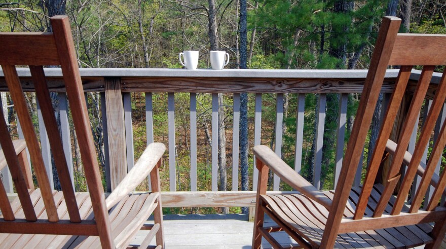 Porch, rocking chairs, coffee cups