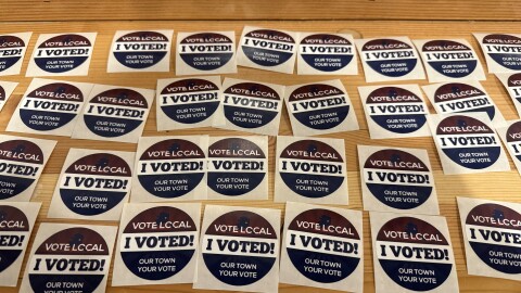 "I Voted" stickers line a counter inside Ursa Major Distilling near Ester, Alaska, on election day, Oct. 7, 2025.