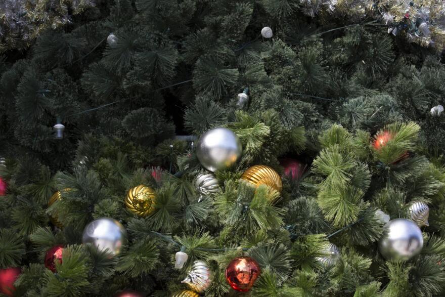 Outdoors Christmas tree with multicolored decorations