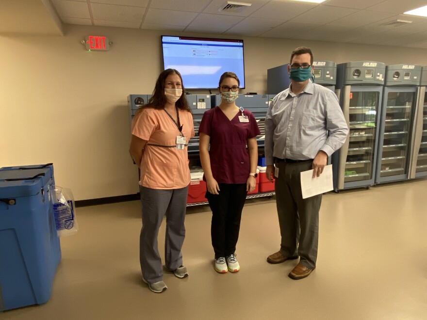 From left: OSF Saint Francis clinical laboratory scientists Katie Middeton and Nicole McGill join MVRBC's Jim Watts in calling for blood donors.