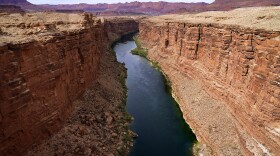 FILE - The Colorado River in the upper River Basin is pictured Friday, May 29, 2021, in Lees Ferry, Ariz. Federal officials said Wednesday, Oct. 25, 2023, that a voluntary plan for Colorado River water conservation by California, Arizona and Nevada should be enough to stabilize the basin for the next few years.