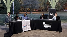 Louisville high school students Quinn McConnell, J.J. Hayden, Bri Woods, and Sofia Ritchie speak with Jenn White at Chickasaw Park. 