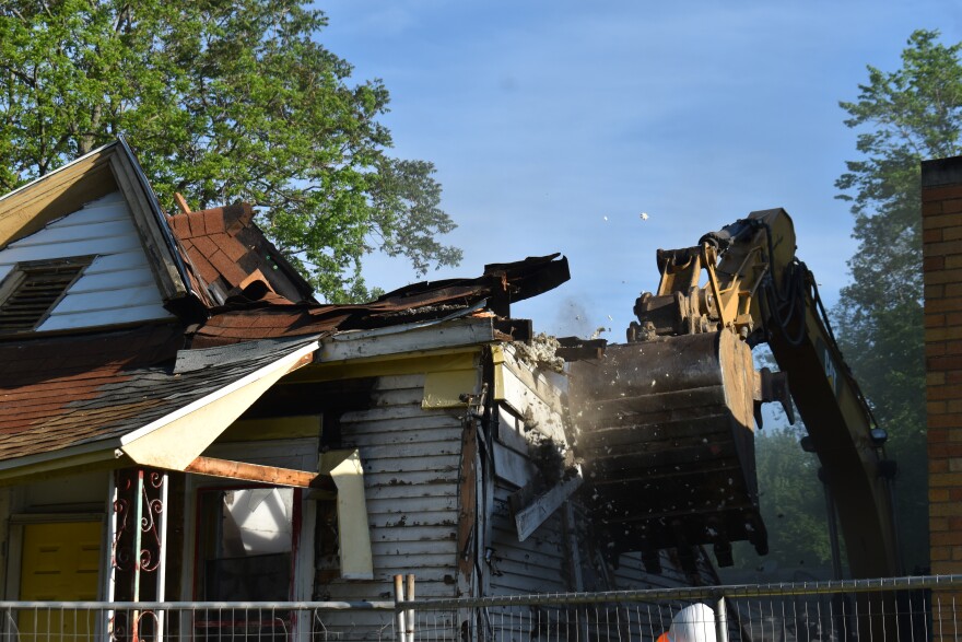 JIMAX crews demolished three vacant houses adjacent to Sovereign Grace Missionary Baptist Church along W. Martin St. on Peoria's South Side. The land will soon become the POTENT Gratitude Park. It's this year's BUILD Peoria project.