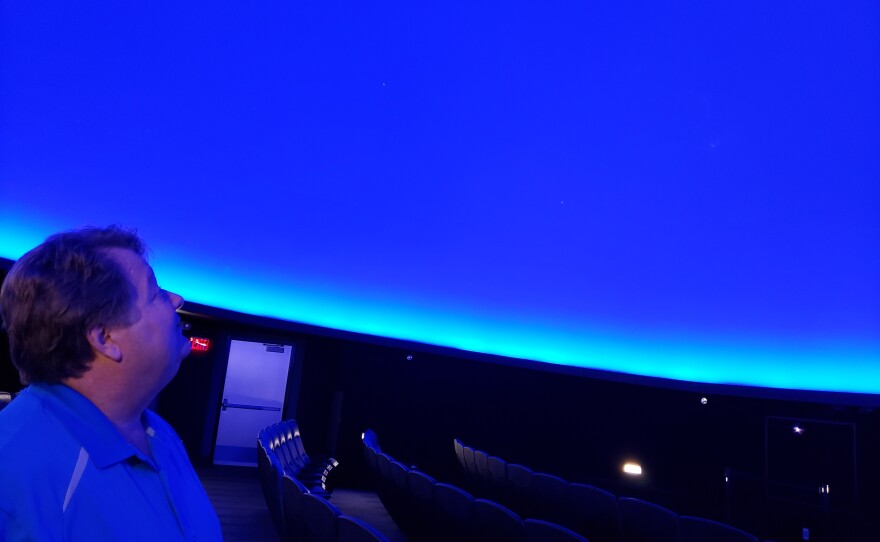 Scobee Education Center Director Rick Varner inside Scobee Planetarium.