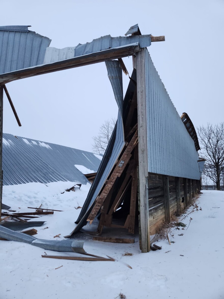 A poultry litter shed that caved in due to last weekend's winter storm.