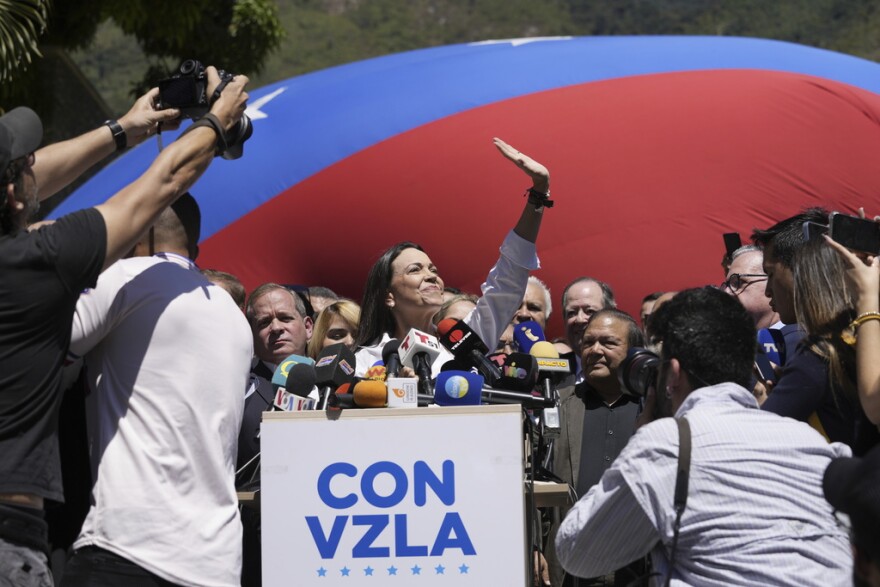 Maria Corina Machado gives a press conference.