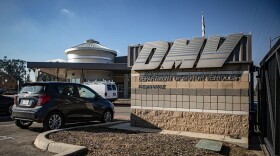 The DMV has asked for $55 million to share its driver license data to a national organization. Advocates say the move could endanger unauthorized immigrants. Department of Motor Vehicles parking lot in central Fresno on Dec. 13, 2022.