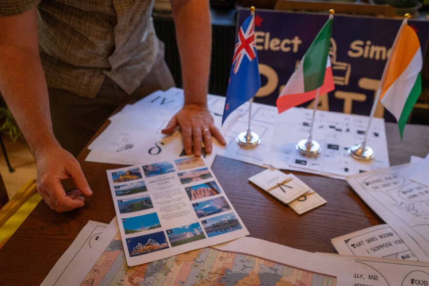 Roberts’ puzzle hunts can take many forms and themes, and props can take the form of flags, cartoons, maps, photos and more.