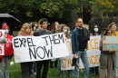 Protesters gathered in a courtyard outside the meeting of the Cornell Board of Trustees on Friday.
