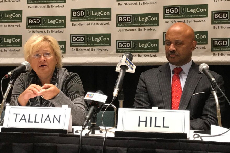 Sen. Karen Tallian (D-Ogden Dunes) next to incumbent Republican Attorney General Curtis Hill at a 2017 legislative conference.