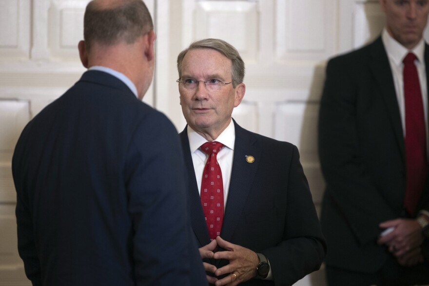 North Carolina Senate Majority Leader Paul Newton talks with guests prior to a luncheon in honor of Japan Prime Minister Fumio Kishida at the North Carolina Executive Mansion, April 12, 2024, in Raleigh.