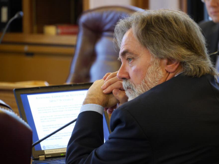 Department of Revenue Commissioner Randall Hoffbeck listens during a House Finance Committee in February. He said on Thursday that a Permanent Fund draw without other new revenue would make it difficult to plan. (Photo by Skip Gray/360 North)