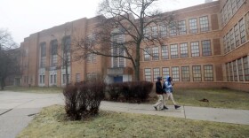 Students walk outside Pershing High School, Friday, Jan. 20, 2017, in Detroit. (Carlos Osorio/AP)