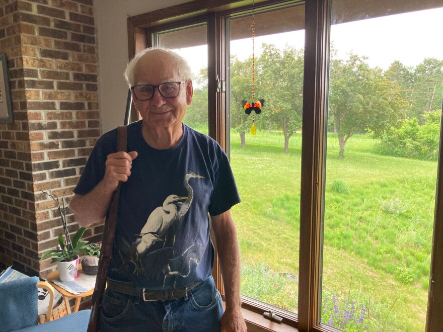 Dave Clausen in his living room in Amery, Wisconsin. (credit: Ellie Katz / Points North)