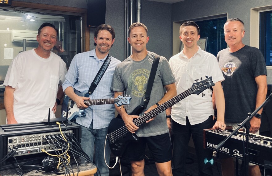 (from left) David Bowman, Derek Wade, Dustin Wade, Chris Marks, and Rob Fenwick of Sideshow Maestros.