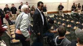 Former astronaut Buzz Aldrin (left) served as the "customer" for a group of Purdue students trying to determine what it'll cost to send a million humans to Mars in the next century.