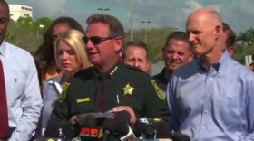Former Gov. Rick Scott with now suspended Broward Sheriff Scott Israel and Supt. Rob Runcie at a 2018 press conference following the shooting at Marjory Stoneman Douglas High School in Parkland, FL.