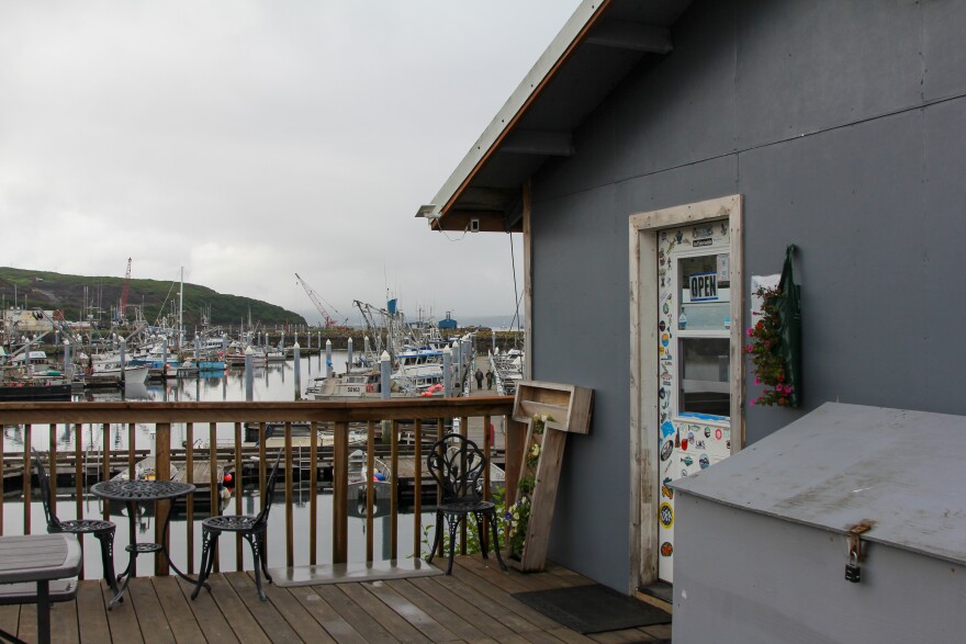 The Small Craft Cafe overlooks the harbor in Sand Point, largely full of locally-owned, small fishing boats. Aug. 7, 2025.