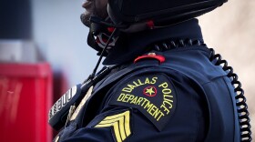 A Dallas police officer patrols from his bike Sunday, Feb. 2, 2025, in Dallas.
