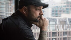 In this Jan. 9, 2017, photo, Christian Picciolini, founder of the group Life After Hate, poses for a photograph in his Chicago home. Picciolini, a former skinhead, is an activist combatting what many see as a surge in white nationalism across the United States. He's doing it by helping members quit groups including the Ku Klux Klan and skinhead organizations. (Teresa Crawford/AP)