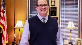 Jason Hicks keeps mementos from past cases on a dresser in his office.