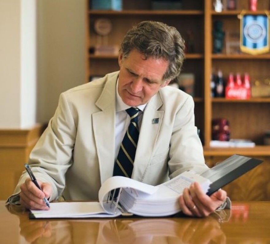 Chattanooga Mayor Tim Kelly, signing the 2022 - 2023 city budget at City Hall.