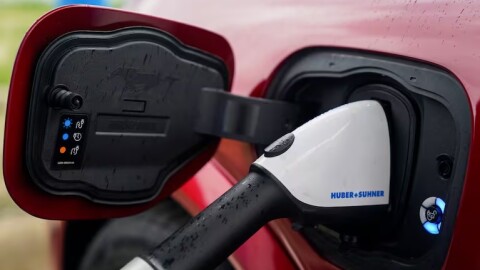 FILE - A 2023 Ford Mustang Mach-E charges, March 8, 2024, at an electric vehicle charging station in London, Ohio.