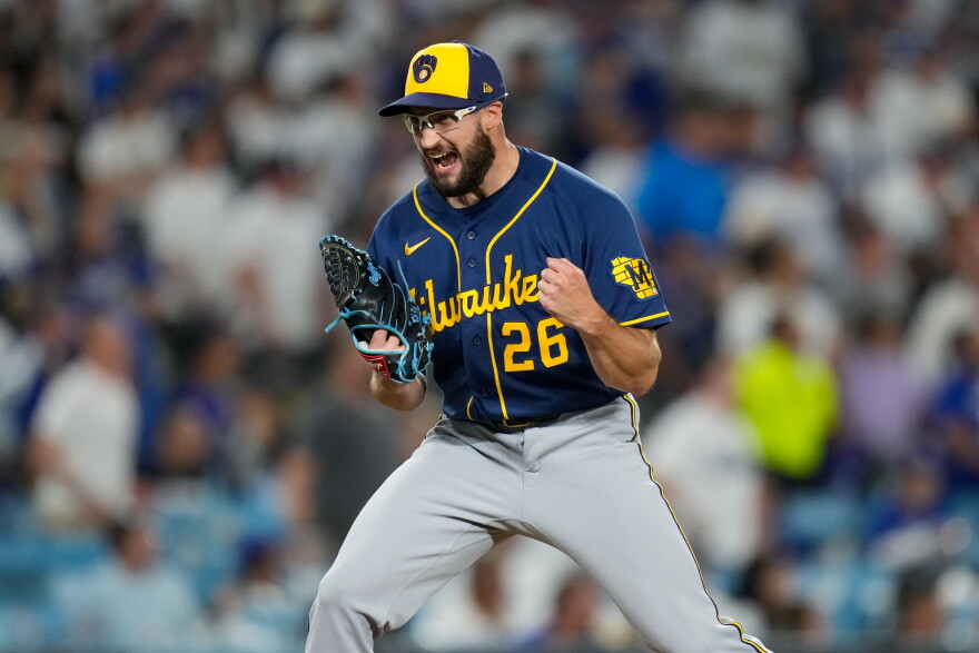Milwaukee Brewers pitcher Aaron Ashby celebrates the final out of Game 4 of baseball's National League Championship Series between the Milwaukee Brewers and the Los Angeles Dodgers, Thursday, Oct. 15, 2026, in Los Angeles. (AP Photo/Ashley Landis)