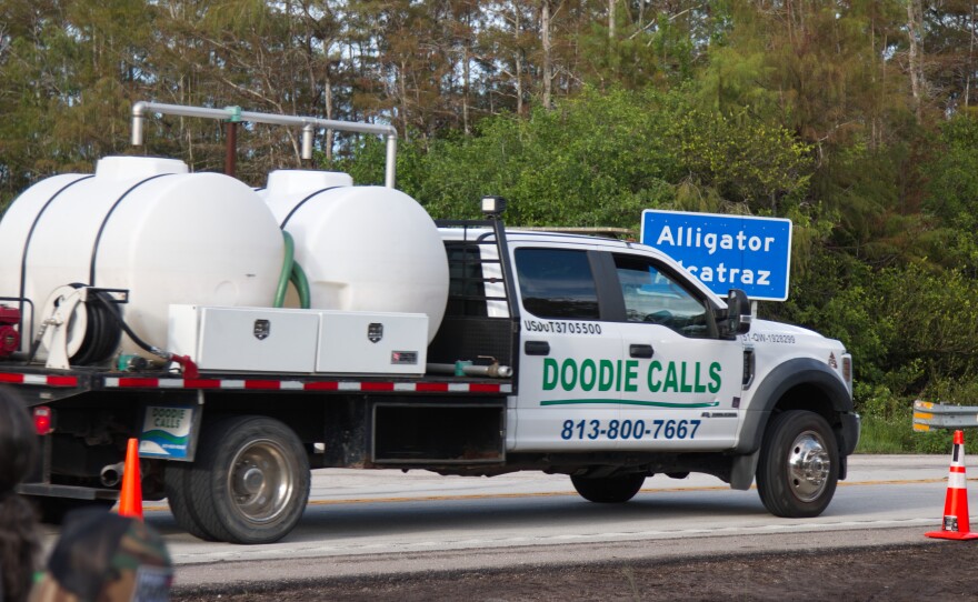 A "Doodie Calls" sanitation tanker truck 