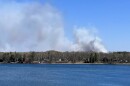 Smoke from the Flanders Fire can be seen May 16, 2026, from the west shore of Pine Lake, south of Crosslake.
