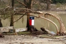 A Lone Star Flag flies at the site of deadly flooding in Kerr County, Texas.