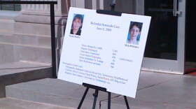 OSBI poster seeking information on the case, outside of courthouse.