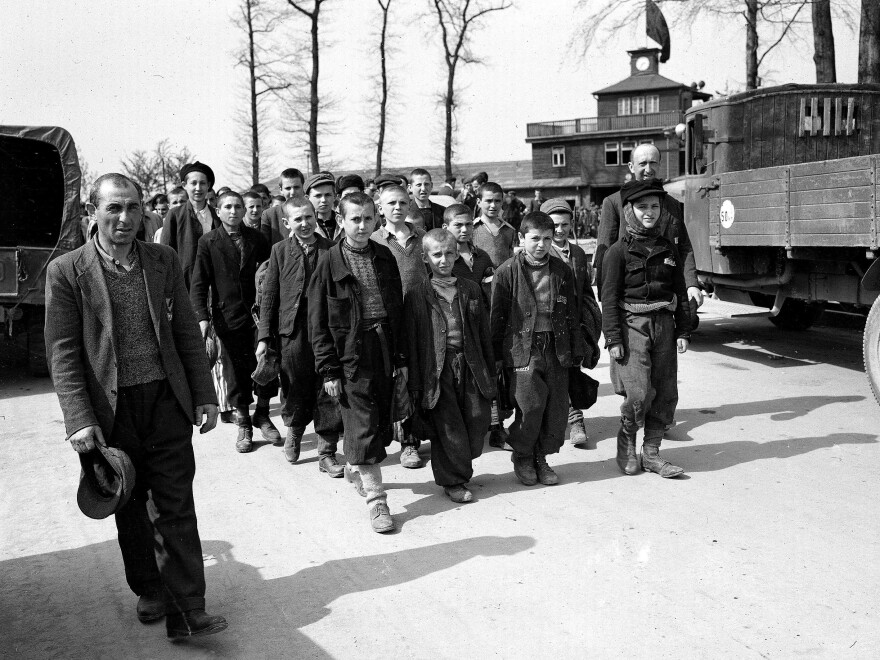 Children and other prisoners liberated by the U.S. Army march from Buchenwald concentration camp in April 1945.