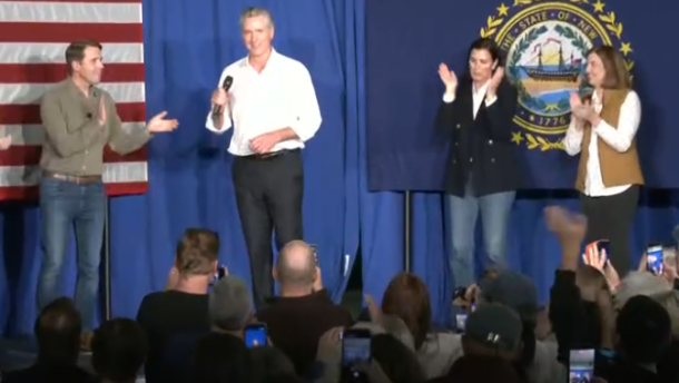 Congressman Chris Pappas welcomes CA Gov. Gavin Newsom to the stage during a Democratic rally at Exeter Town Hall, Saturday, October 18, 2026
