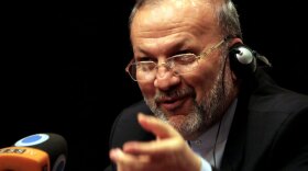 Manouchehr Mottaki, then Iran's foreign minister, speaks during a Dec. 4 news conference in Manama,  Bahrain. Nine days later, on Dec. 13, President Mahmoud Ahmadinejad abruptly fired Mottaki while he was on state business in Senegal.