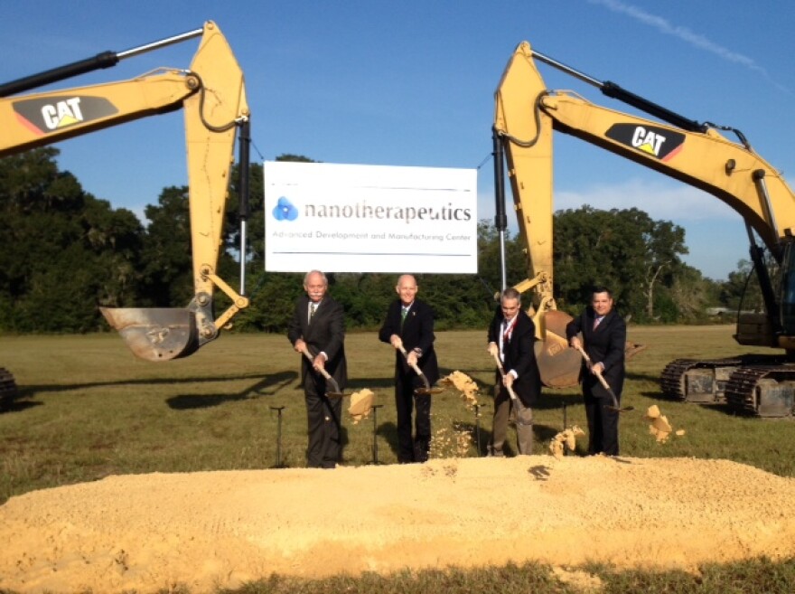 Gov. Rick Scott, second from the left, broke ground on the Nanotherapeutics facility along with Alachua Mayor Gib Coerper and Nanotherapeutics President and CEO Dr. James Talton.