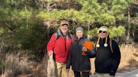 Virginia Beach residents Tim Solanic, Julia Bell and Howard Weinberg at Pleasure House Point Natural Area on Thursday, Dec. 19, 2024. They are concerned about a city project that will cut down trees to turn the area into tidal wetlands.