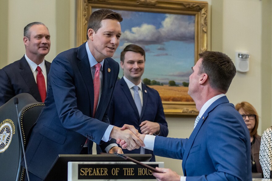 Lieutenant Governor Matt Pinnell shakes hands with Governor Kevin Stitt moments before last year's State of the State Speech, Feb. 6, 2023, at the Oklahoma State Capitol. That summer, Stitt appointed Pinnell as Secretary of Workforce Development.