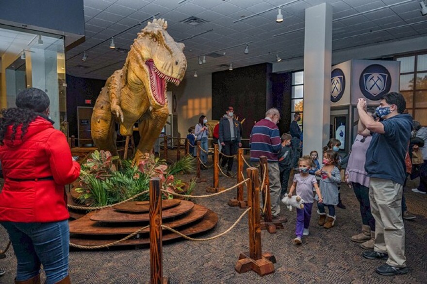 RMSC's "Expedition Dinosaur" exhibit features life-sized animatronic creatures and interactive games.
