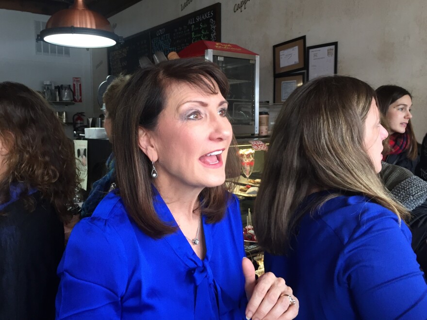 Democrat Marie Newman speaks with supporters at a campaign event in La Grange, Ill.