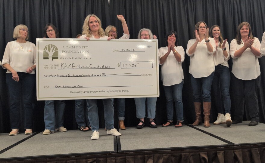 KAXE is revealed as the nonprofit that received the most votes at the 100+ Women Who Care Itasca Area event on Oct. 13, 2025, at Timberlake Lodge in Grand Rapids.